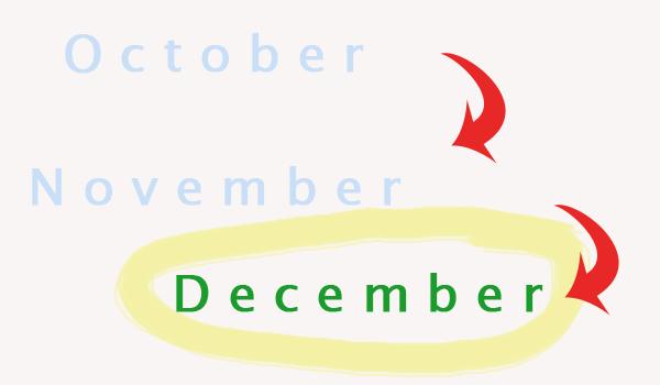 A piece of paper with October, November and December written on it.  December is circled